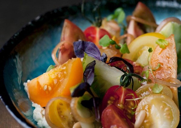 Tomatoes with wasabi mascarpone and pine nuts
