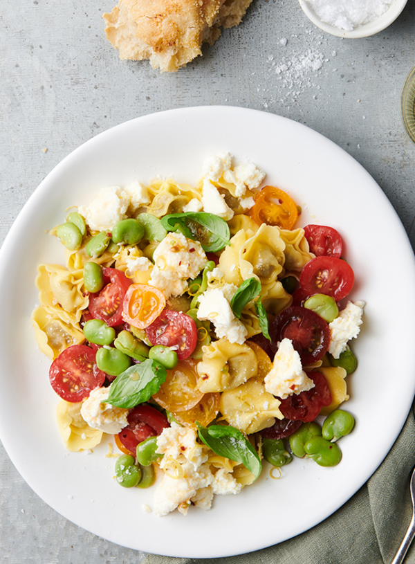 Tortellini with fresh tomatoes, broad beans and ricotta