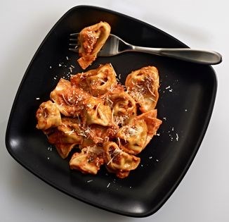 Tortelloni filled with ricotta and parsley (Torgelloni di ricotta e prezzemolo)