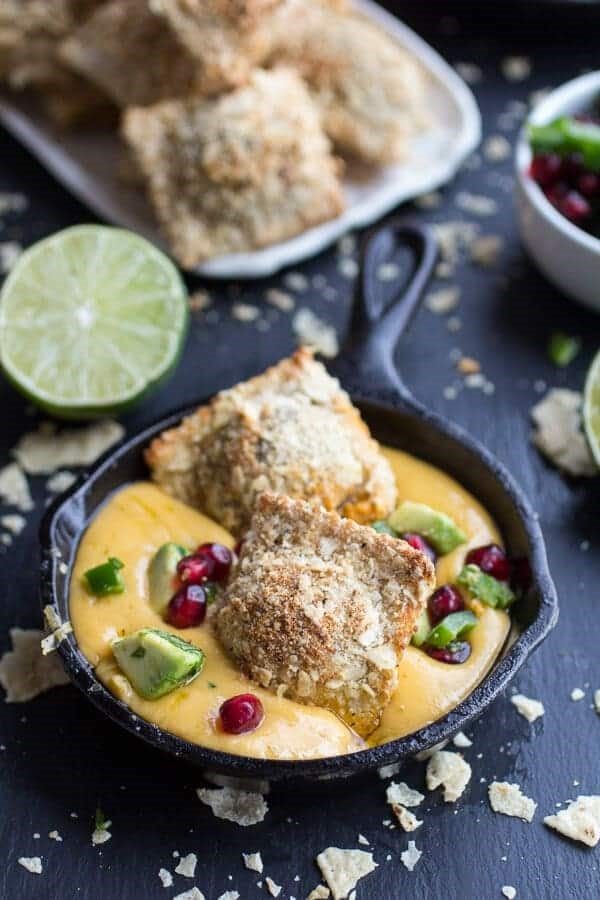 Tortilla chip crusted oven-fried ravioli with spicy Fontina queso fundido + spinach chorizo ravioli