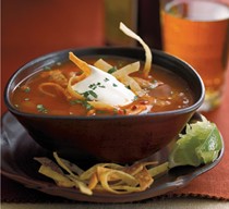 Tortilla soup with chicken, lime, and smoked chilies 