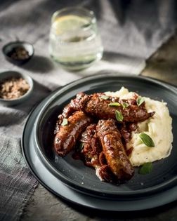 Toto's bangers and mash with caramelised onion gravy