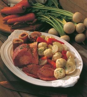 Traditional corned beef with vegetables and dumplings