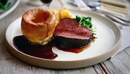 Treacle-cured beef and roast potatoes with Yorkshire puddings
