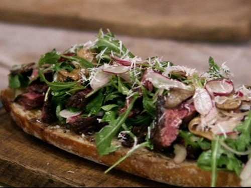 Trencher with hanger steak and warm mushroom and watercress salad