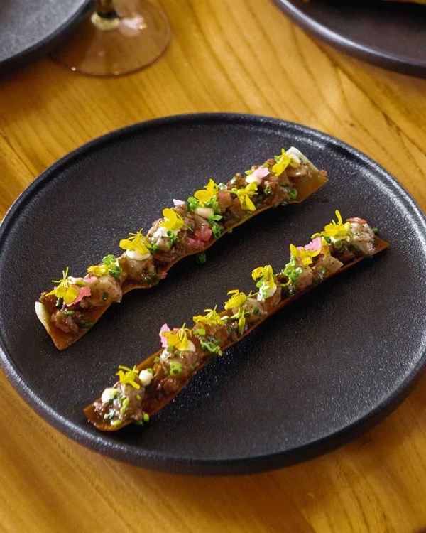 Trevally tartare with preserved lemon, pomegranate & sumac (Samak nayeh)