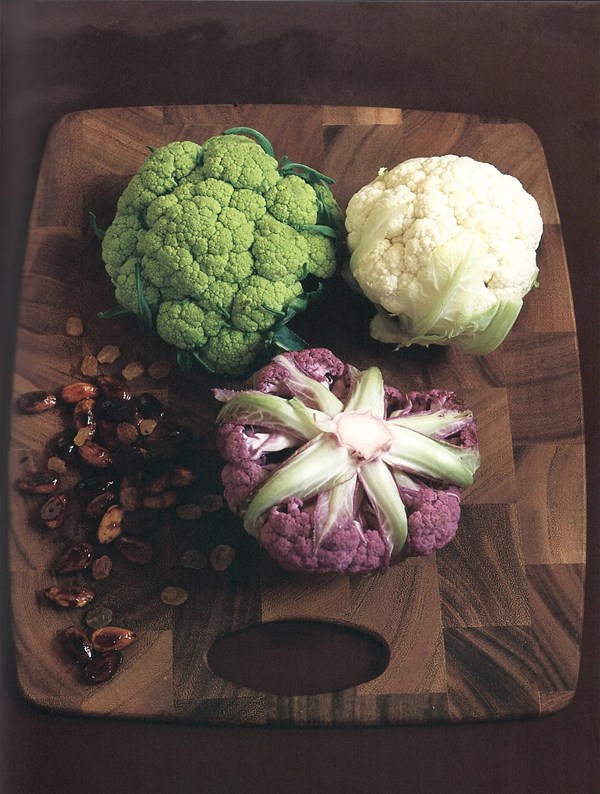 Tricolor cauliflower salad with caramelized almonds, golden raisins, and hummus vinaigrette