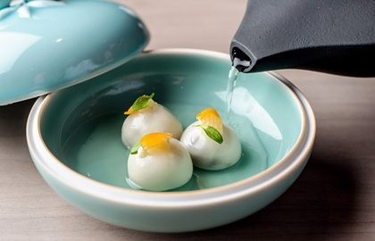 Trio of chocolate dumplings with yuzu and ginger infusion