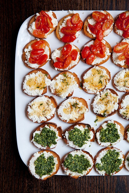 Trio of crostini: Roasted tomato, herbed honey, and kale pesto with fresh ricotta