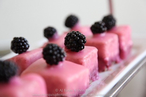 Triple berry curd filled financier petit fours