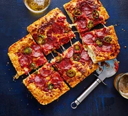 Triple cheese, pepperoni & jalapeño pizza