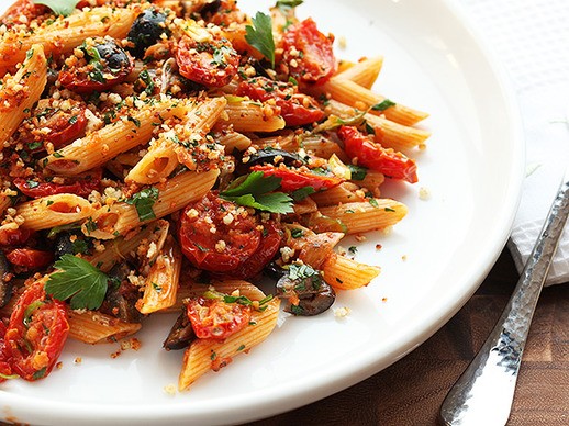 Triple garlic pasta with oven-dried tomatoes, olives, and bread crumbs