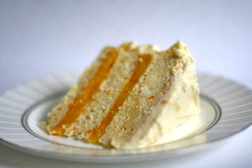 Triple-layer white cake with orange curd filling