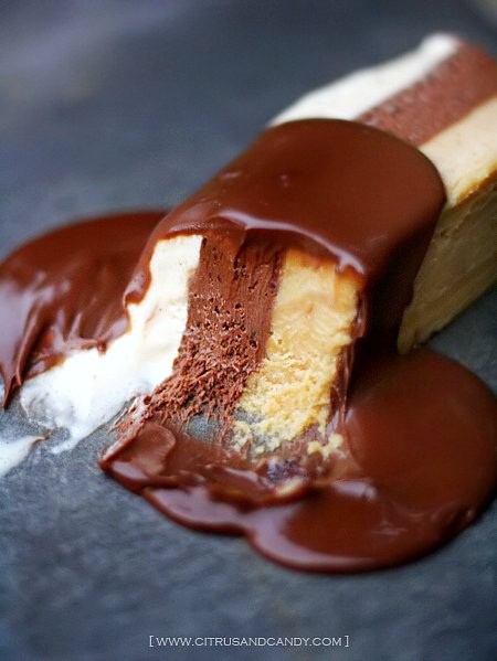Triple-layered vanilla, chocolate and peanut butter parfait