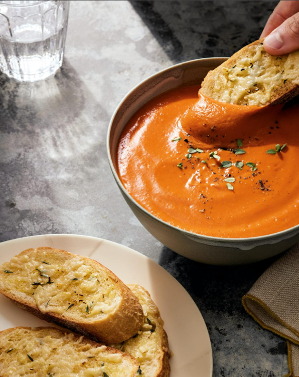 Triple tomato soup with cheesy garlic bread