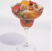 Tropical fruit salad in planter's punch