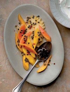 Tropical fruit salad with a chilli, star anise, cinnamon and lime dressing