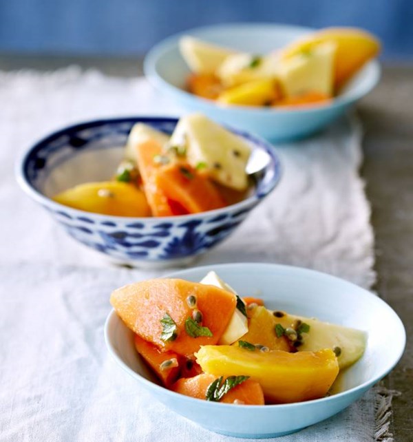 Tropical fruit salad with mint and passionfruit syrup