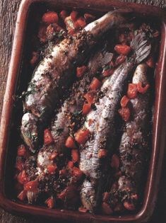 Trout poached in saffron wine and olive oil with parsley