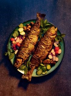 Trout stuffed with herbs, barberries & walnuts (Mahi-e shekam por)