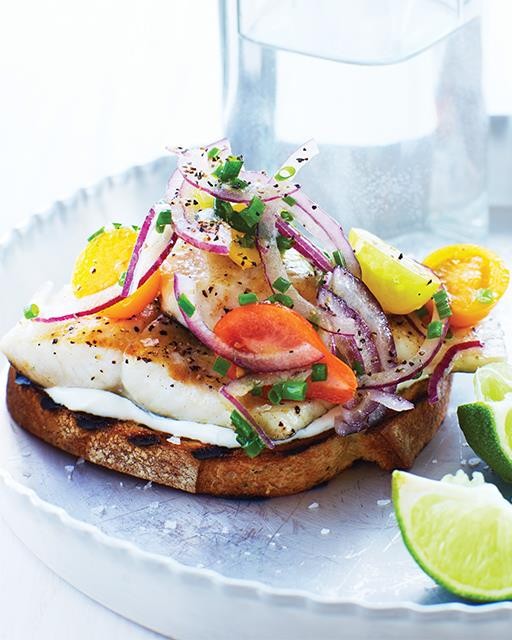 Trout with tomato salad on toast