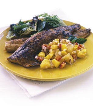 Trout with tropical fruit salsa and mixed greens