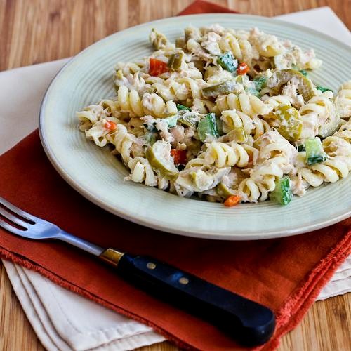 Tuna pasta salad recipe with lemon, green olives, and cucumbers