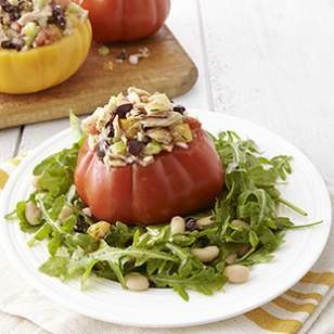 Tuna salad-stuffed tomatoes with arugula