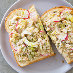 Tuna salad with hard-cooked eggs, radishes, and capers