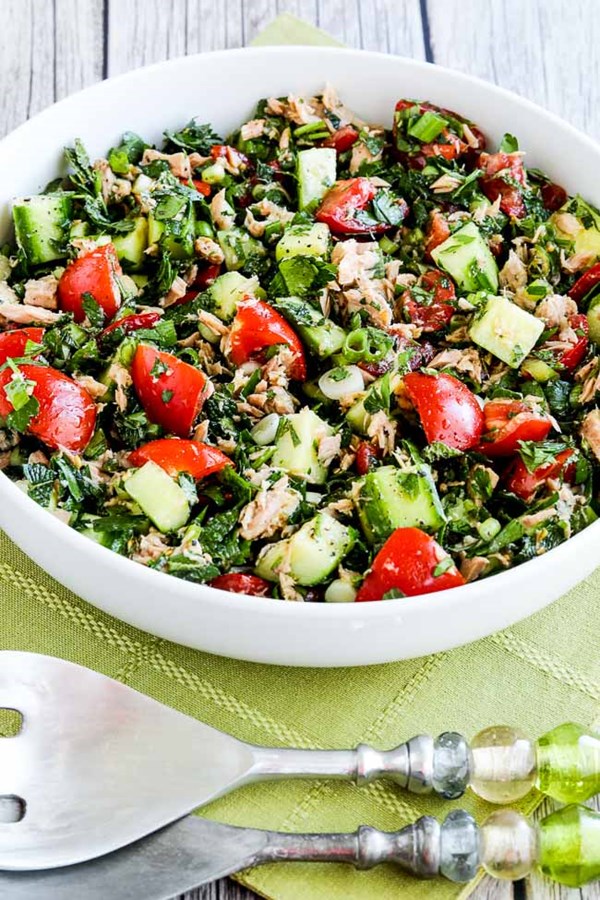Tuna salad with tomatoes, cucumbers, parsley, and mint