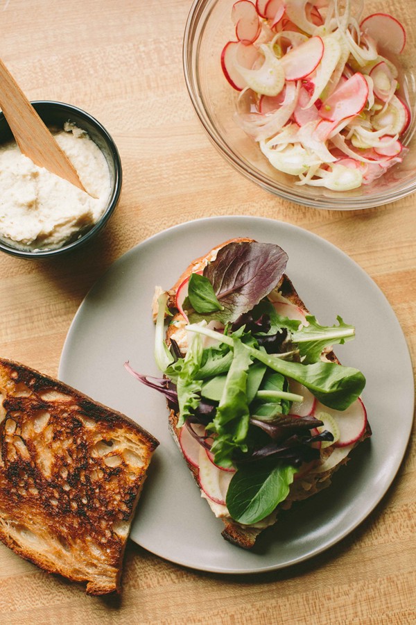 Tuna sandwich with pickled radish, fennel + white bean spread