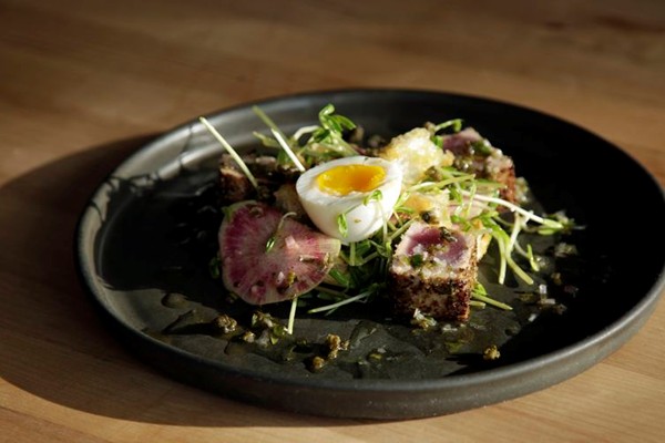 Tuna with a soft egg, lemon, and capers
