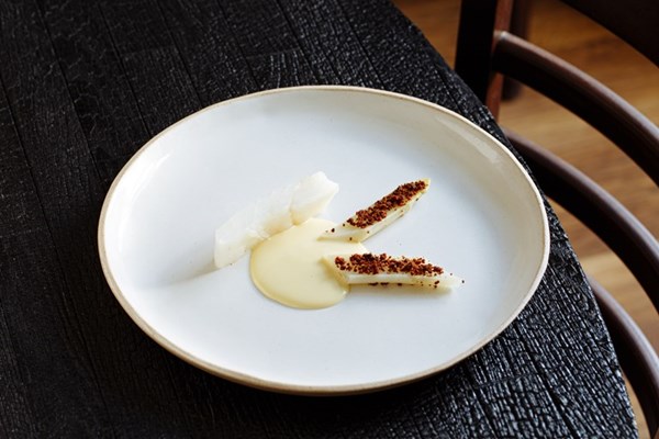 Turbot confit in smoked lardo with white asparagus and sauce vin jaune