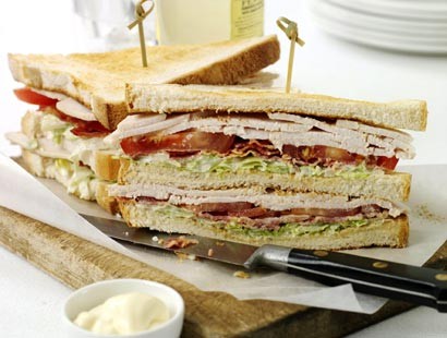 Turkey and bacon club sandwich with lemon mayo