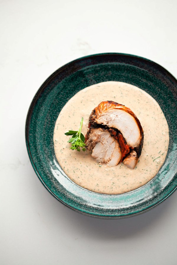 Turkey breast with red pepper, black garlic & almond sauce