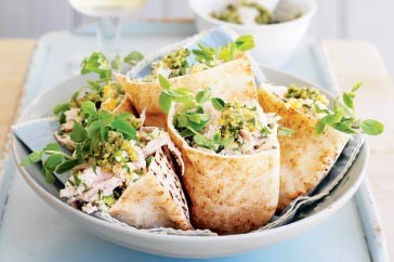 Turkey, couscous salad and spicy green olive pesto pittas
