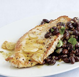 Turkey cutlets and black beans with tangerine-habanero mojo sauce