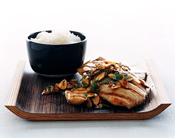 Turkey cutlets with cilantro-almond sauce
