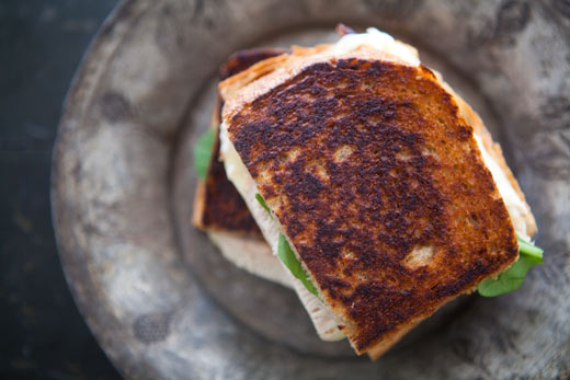Turkey grilled cheese sandwich with pickled onions