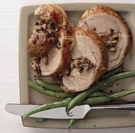 Turkey thighs stuffed with porcini, sausage, and artichoke hearts