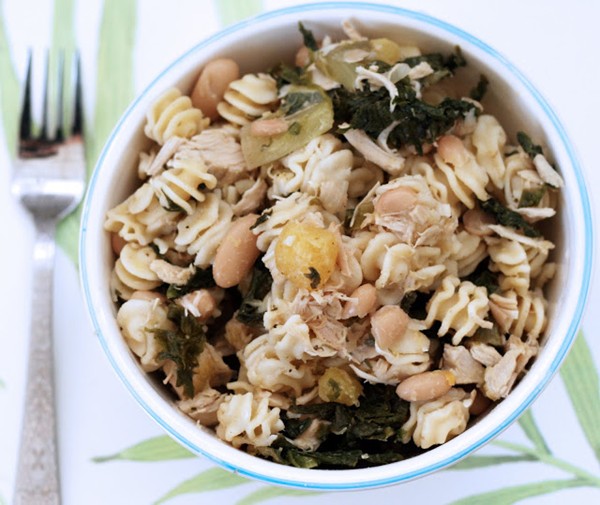 Turkey with escarole, acorn squash and cannelloni beans over pasta