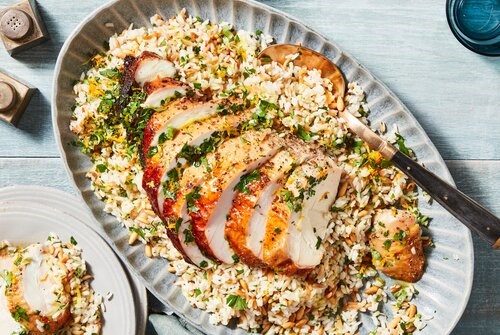 Turkey with orzo pilaf, pine nuts & gremolata