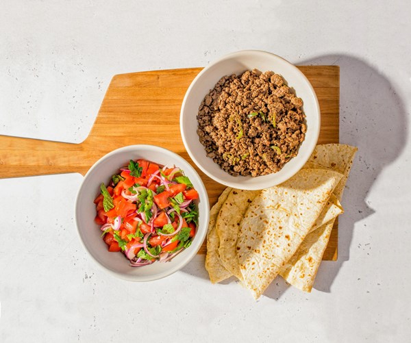 Turkish-inspired beef wraps with tomato-onion salad