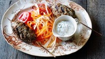 Turkish kofta kebabs with minted yoghurt and kohlrabi and carrot salad