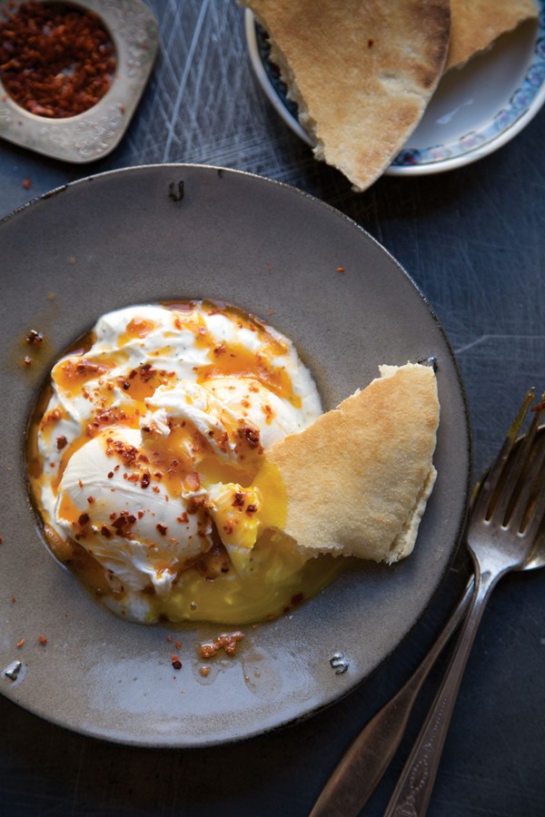 Turkish poached eggs in yogurt (Cilbir)