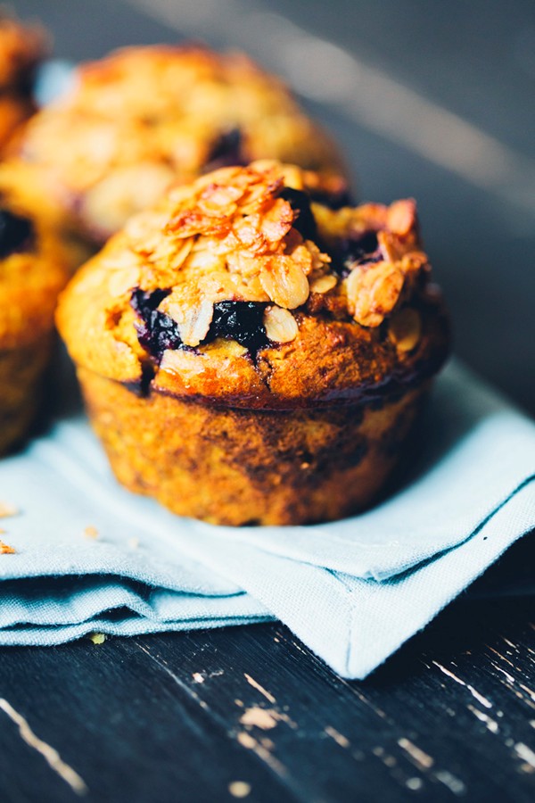 Turmeric & blueberry breakfast muffins with a granola topping