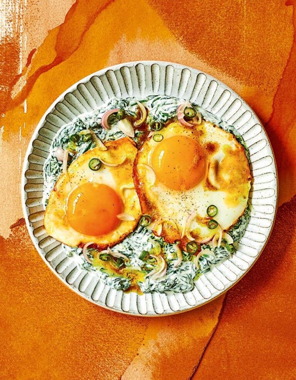 Turmeric eggs with spinach and pickled shallots 