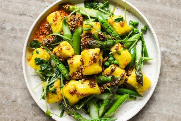 Turmeric gnocchi with spring veggies 