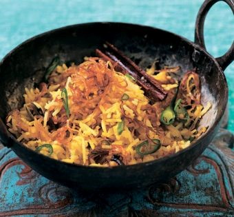 Turmeric-tinged rice with fried onion