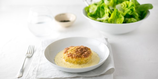 Twice-baked leek soufflé with Etivaz cheese sauce and green salad